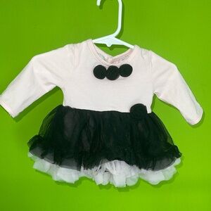 Adorable pink & back ruffle dress with black rosettes. EUC Newborn